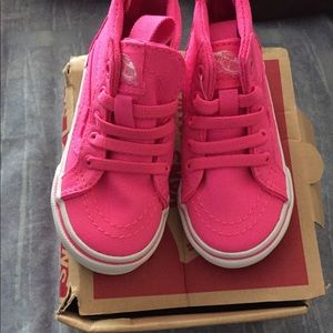 Baby pink girl vans sneakers.